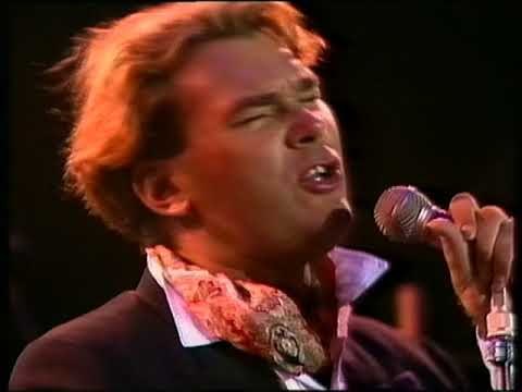 Marc Hunter singing at the microphone